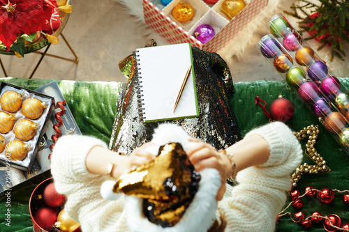 Cuadros en Lienzo stressed housewife tired of holiday bustle in room at Christmas