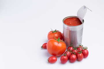 in of chopped canned tomatoes with whole fresh tomatoes, isolated on white background, soft light