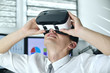 © vetkit - Trader Man Wearing Virtual Reality Googles