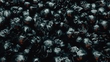 A Camera Span Over An Endless Pile Of Black Textured Human Skulls. The Concept Of Death And Horror. A Bunch Of Skulls Awesome Halloween Horror Picture. Seamless Loop 3d Render