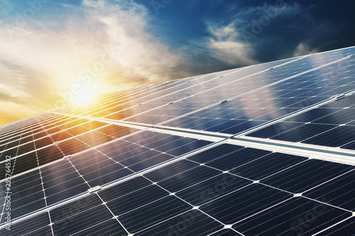 Cuadros en Lienzo Solar panel with blue sky and sunset