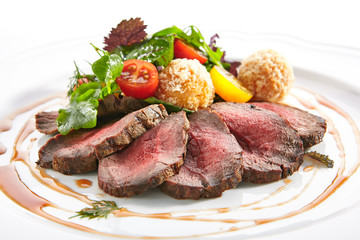 Wall Mural - Medium Rare Roast Beef with Green Mix and Potato Balls