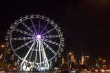 Fototapeta Miasto - night ferris wheel illuminated with lights