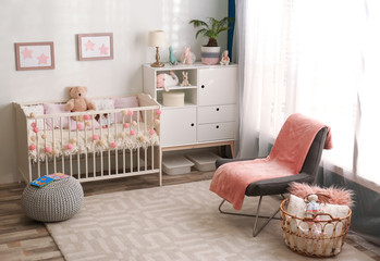 Wall Mural - Cozy baby room interior with comfortable crib