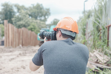 take pictures in the construction shire being built.