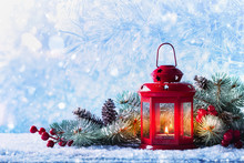 Christmas Lantern In Snow With Fir Tree Branch. Winter Cozy Scene.