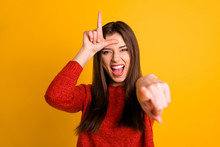 Photo Of Cheerful Rude Ridiculous Girlfriend Pointing At You Showing Lose Sign Screaming Laughind Isolated Over Yellow Vivid Color Background