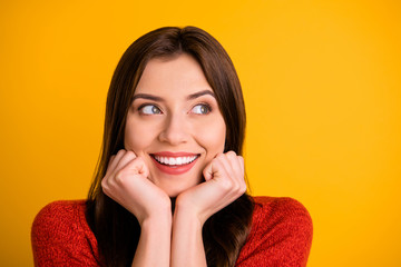 Photo of cheerful nice charming cute attractive girlfriend smiling toothily dreaming of goods discounts isolated over yellow bright background