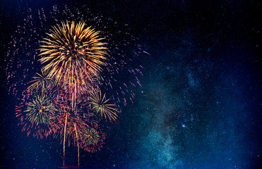 Wall Mural - fireworks with blur milky way background