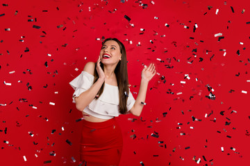 Wall Mural - Portrait of her she nice-looking attractive lovely fascinating gorgeous pretty luxurious carefree cheerful cheery positive lady having fun clubbing isolated on bright vivid shine red background