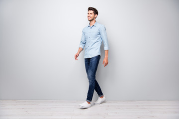 Poster - Full size turned photo of positive cheerful man have free time fun go walk want meet university friends wear casual style clothes isolated over grey color background