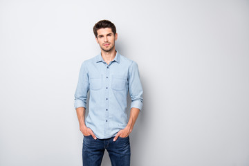 Portrait of gorgeous serious manager businessman put hands pocket feel like true leader wear denim jeans clothes isolated over grey color background