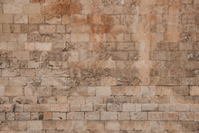 Old And Weathered Large Stone Blocks Wall Texture. Beige Sandstone Tones