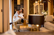 © BGStock72 - Young couple relaxing at luxurious home with digital tablet
