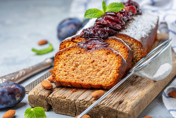 Wall Mural - Homemade plum cake with almonds and spicy plum.