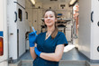 © Kate - Young professional nurse in medical uniform, show syringe in her hands at ambulance background
