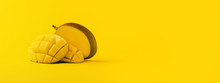 Mango Fruit With Mango Sliced Cubes On Yellow Background, Panoramic Image With Space For Text.