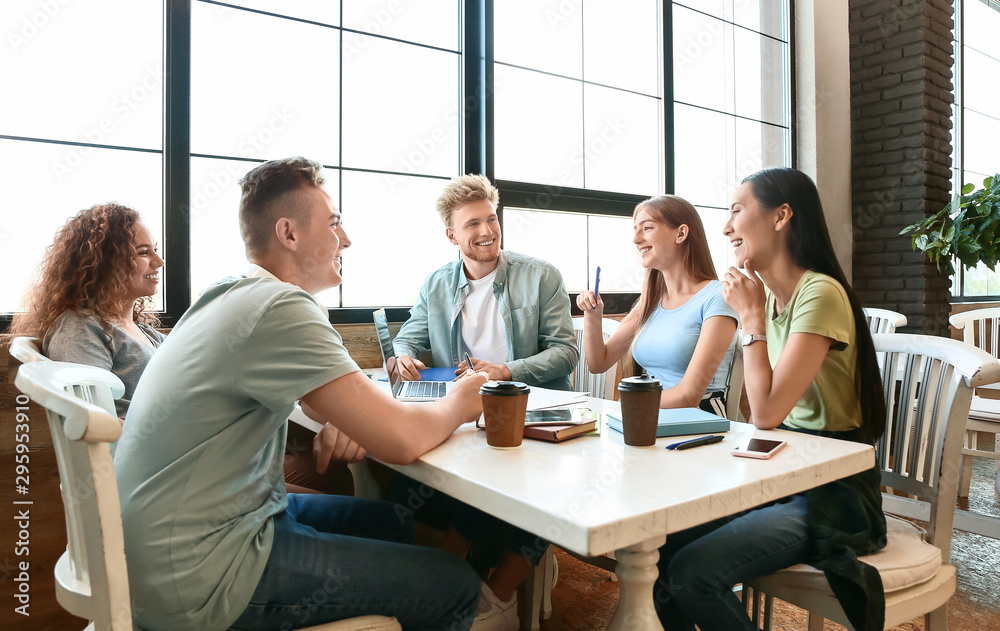 Group of students preparing for exam in university