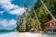 © Igor Tichonow - Philippines scenic, Palawan - El Nido island hopping tour view of karst Pinagbuyutan Island, cliffs and deserted house