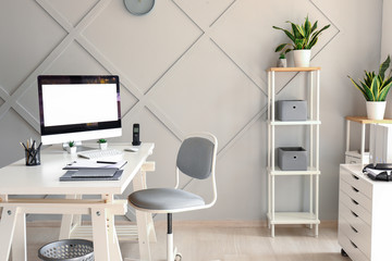 Comfortable workplace in modern office