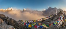 Panoramic Shot Of Colorful Tibetan Prayer Flags On A Mountain