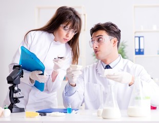 two lab doctor testing food products