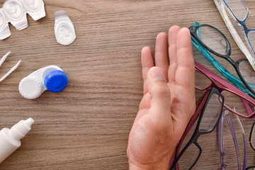 Sticker - Hand rejecting glasses in favor of contact lenses