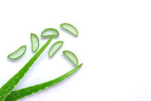 Green Fresh Aloe Vera Leaves And Slices  Isolated On White Background. Top View.