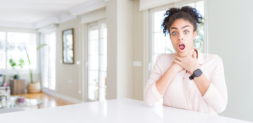 Poster - Wide angle of beautiful african american woman with afro hair shouting suffocate because painful strangle. Health problem. Asphyxiate and suicide concept.