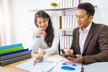 Business woman presenting the marketing report by financial report document paper to manager at meeting