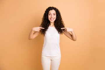 Wall Mural - Photo of amazing pretty lady self-confidently pointing fingers on her chest advertising own personality wear white casual outfit isolated beige pastel color background