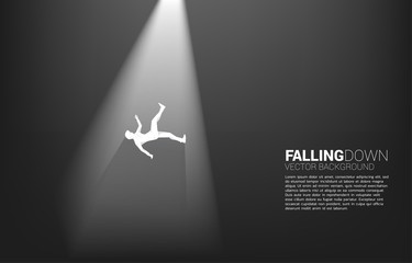 silhouette of businessman falling down in the light. Concept for fail and accidental business