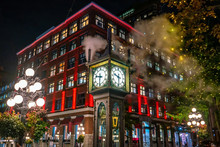 Old Steam Clock In Vancouver's Historic Gastown District At Night