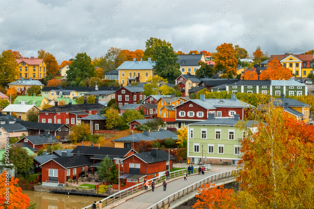 View of old Porvoo, Finland. Beautiful city autumn landscape with colorful wooden buildings. - obrazy, fototapety, plakaty 