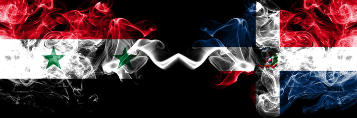 Syria vs Dominican Republic smoke flags placed side by side. Thick colored silky smoke flags of Syrian and Dominican Republic