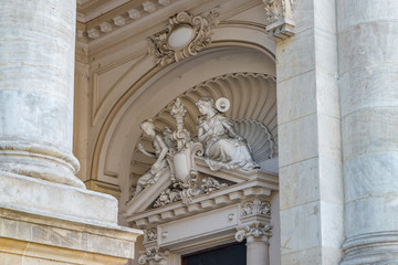 Canvas Print - National Museum of Romanian History building in Bucharest, Romania. National Museum of Romanian History on a sunny summer day with a blue sky. Statue detail