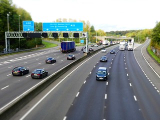 Tilt shift photo of the M25 London Orbital Motorway near Junction 17 in Hertfordshire, UK