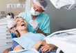 © JackF - Male dentist with female patient during checkup