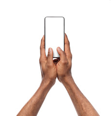Poster - Black man's hands typing message on smartphone with blank screen