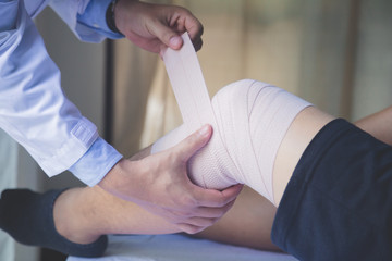 Patient with knee problem at consulting room, Physical therapy concept.