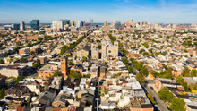 Wide Aerial Perspective Over Streets And Neighborhoods Of Baltimore Maryland