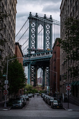  View of one of the towers of the Manhattan Bridge from the streets of the DUMBO district, Brooklyn, NYC 