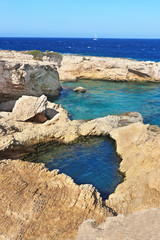 Wall Mural - landscape of natural pool of the sea between the rocks at Ano Koufonisi island Cyclades Greece