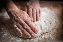 Making Dough By Female Hands On Wooden Table Background Close Up