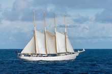 Sailing Ship With Four White Sails