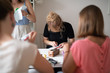 © viktor holm - Women at a cross-stitching class