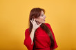 © Petro - Beautiful lady focusing on something to listen. She looks surprised as she wants to hear properly and clear, so she is using her hands to make it loud.