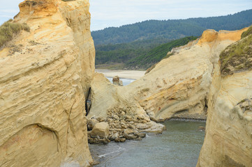 Sandy mountain or rock in the sea or ocean. Landscape, beautiful views.