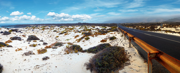 Wall Mural - image related to unexplored road journeys and adventures to the beaches of spain.road through the sc