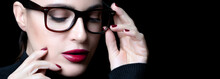 Beautiful young woman wearing glasses. vision correction, optometry and fashion eyewear concept